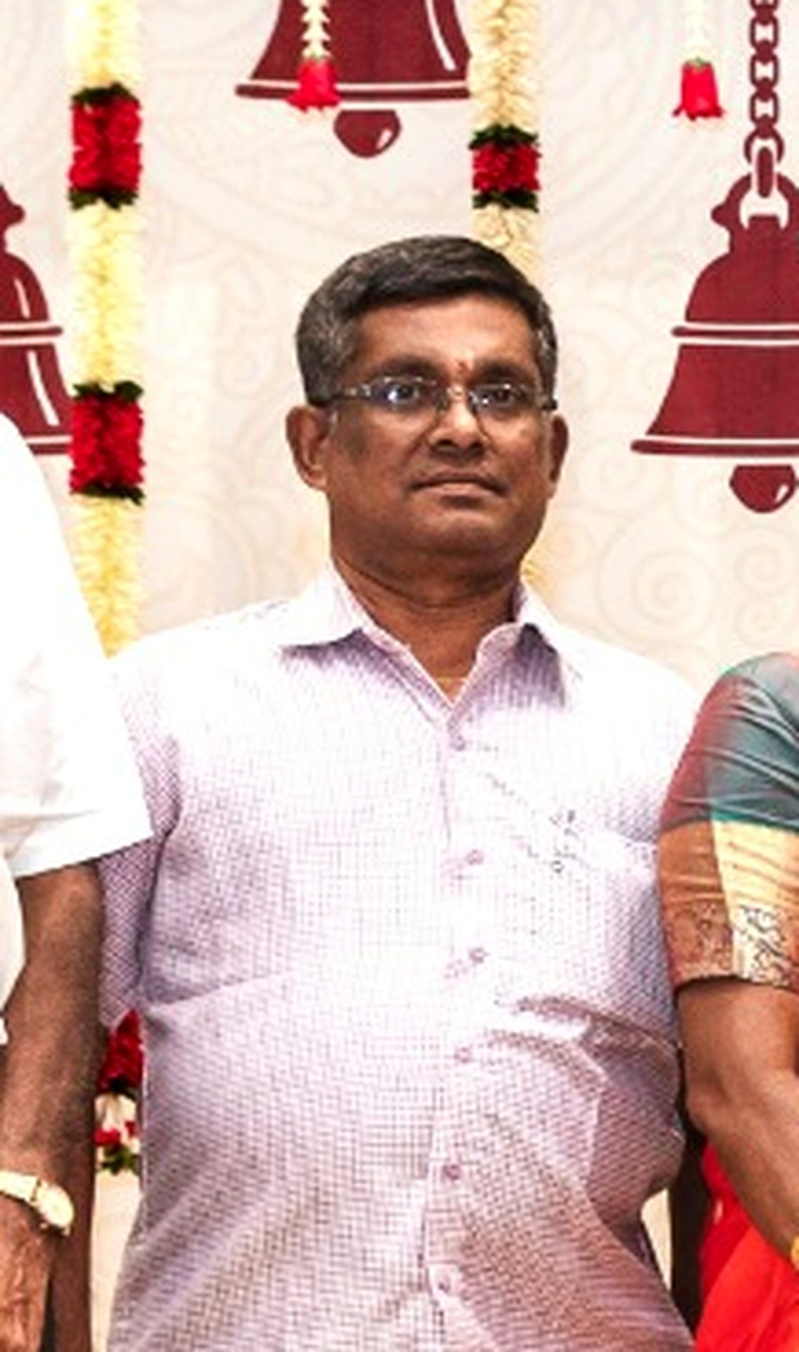Mr. K. Krishnan — Mirunalini's Father