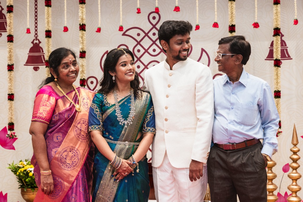 Engagement — Couple with Parents after the ceremony