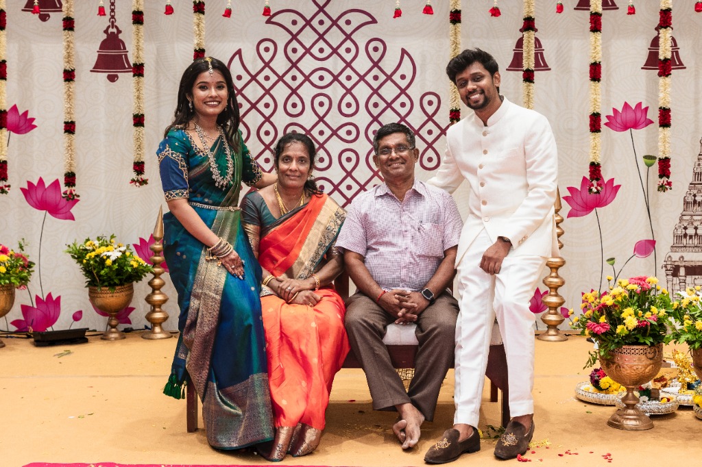 Engagement — Couple with Bride's parents on stage