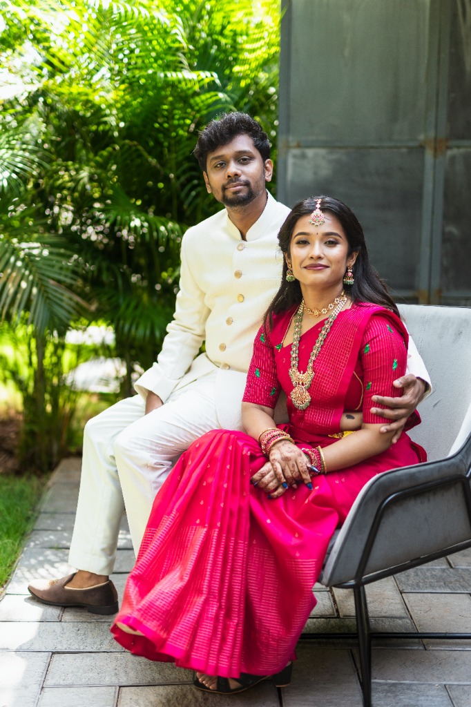 Pre-Wedding — Couple seated together in garden, serene portrait