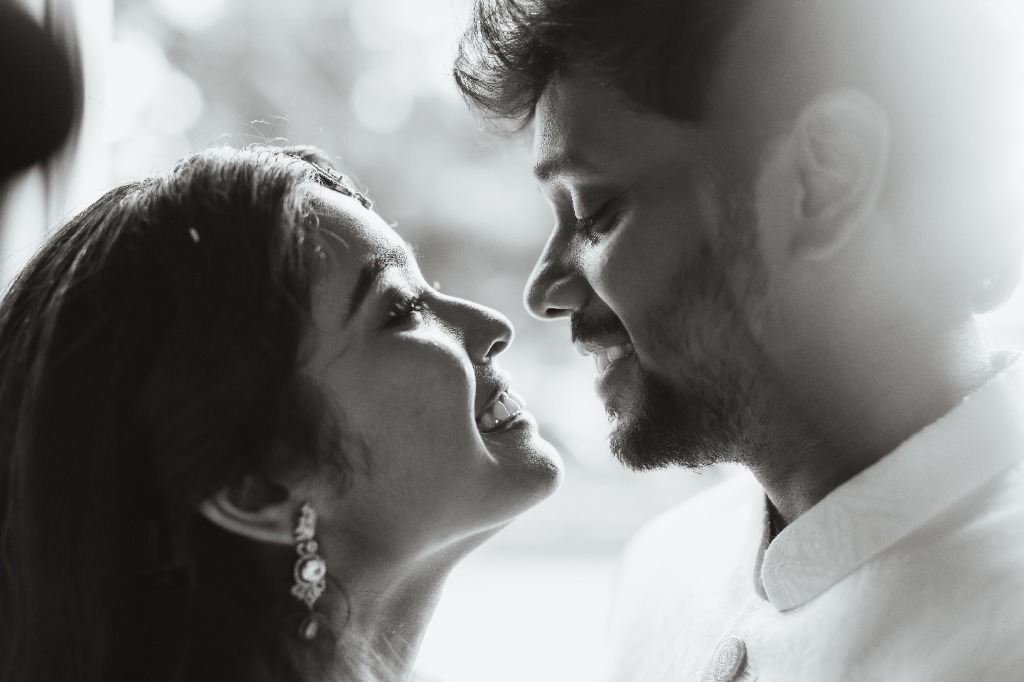 Pre-Wedding — Black & white close-up of couple face-to-face, smiling