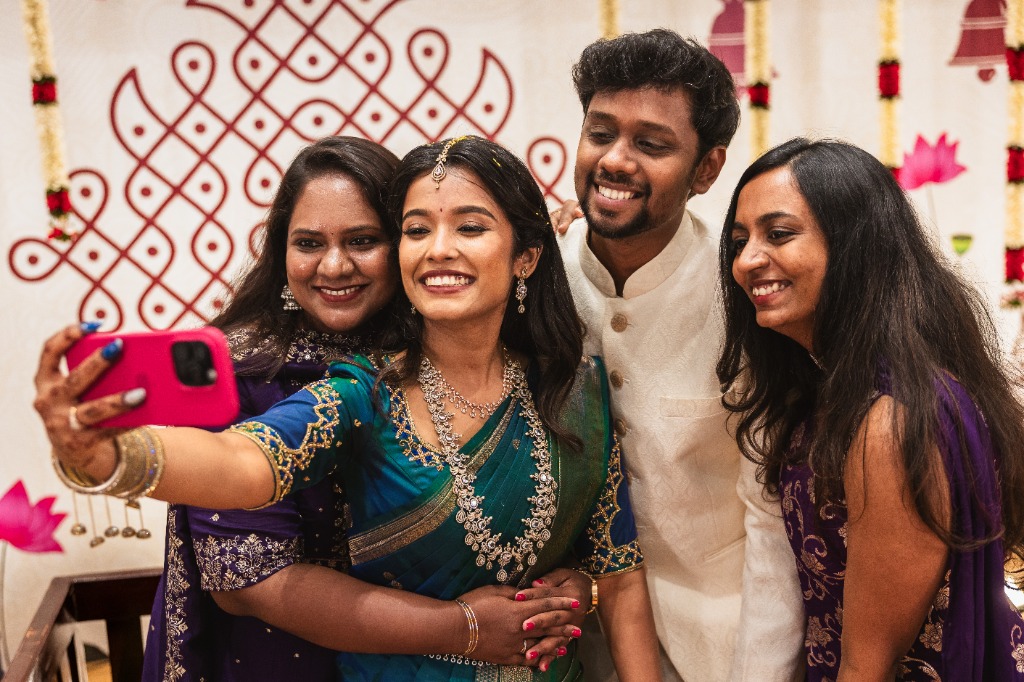 Engagement — Couple and friends selfie at the mandap stage