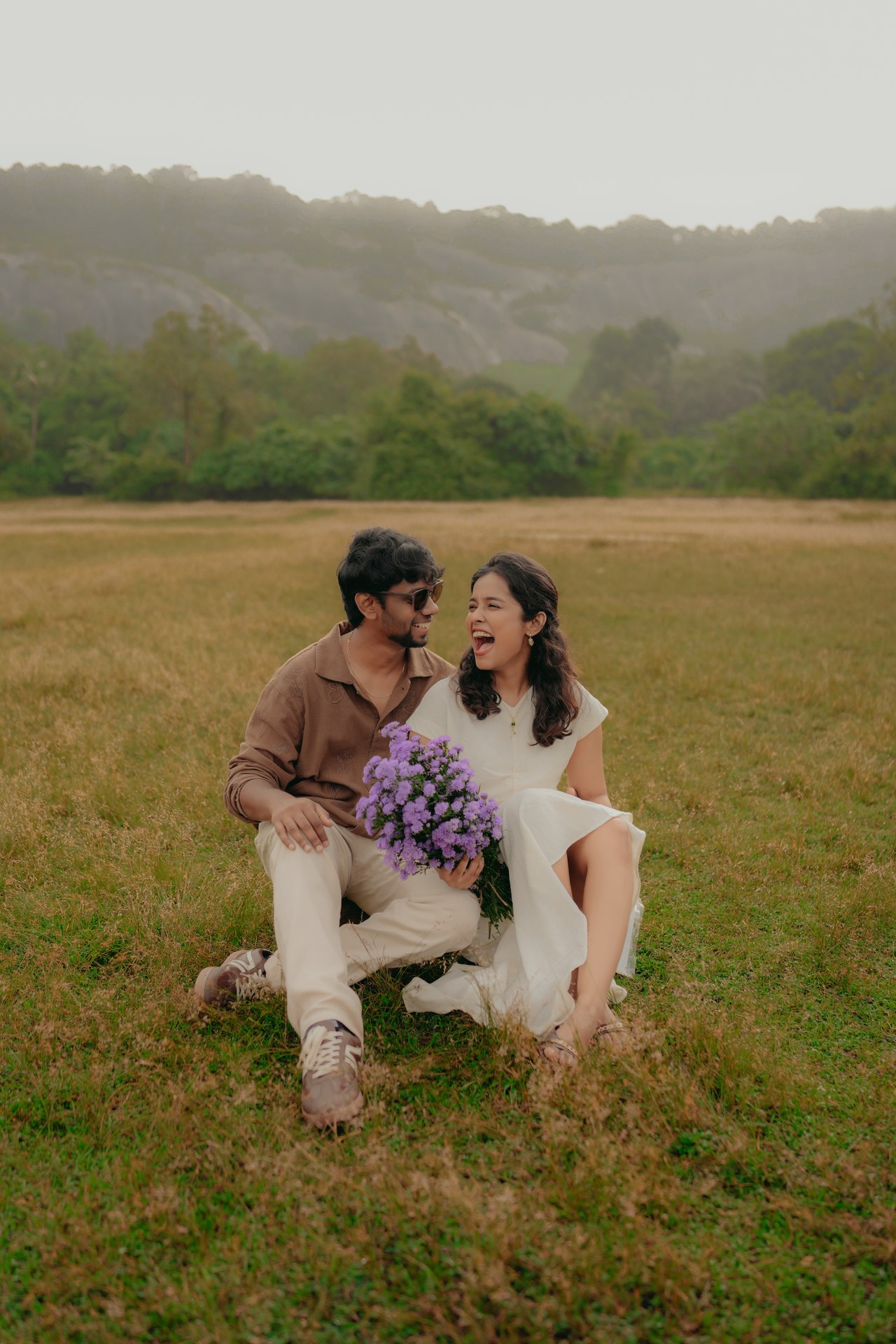 Pre-Wedding — Karthik carrying Mirunalini, warm golden sunset light